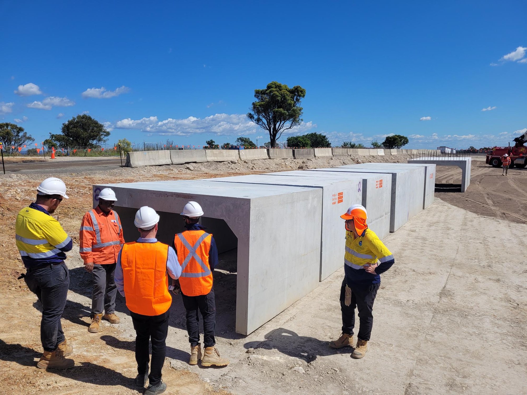 People viewing large box culvert